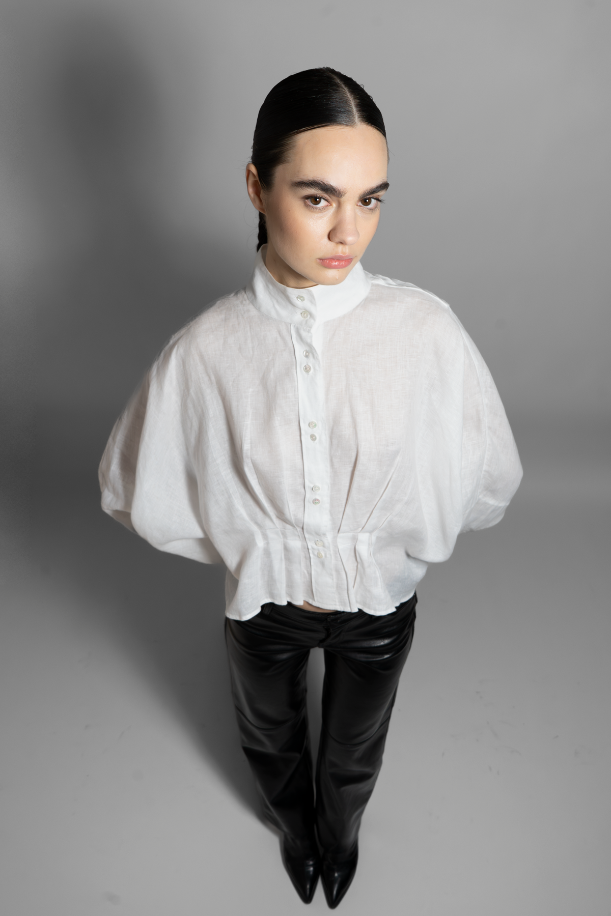 The Art of Sleeves Cutting and Stitching in Architectural Fashion