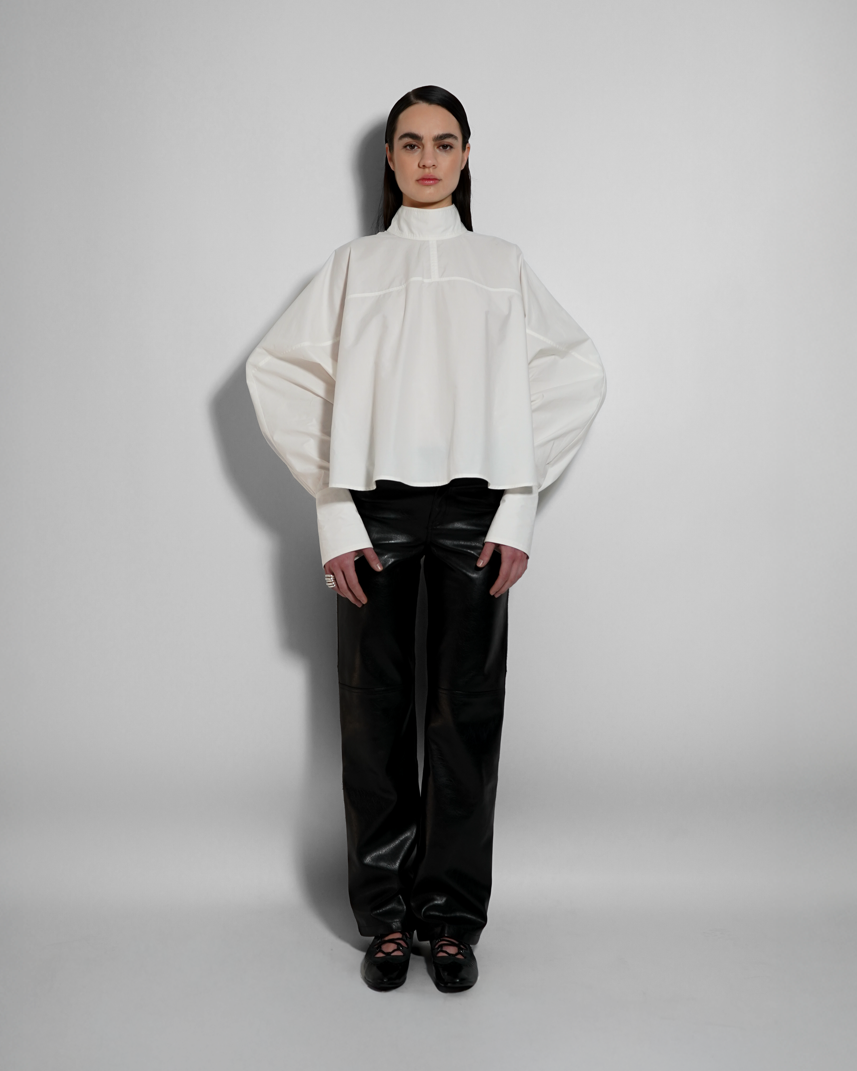 women oversized white shirt structured silhouette fluid drape elegant look
