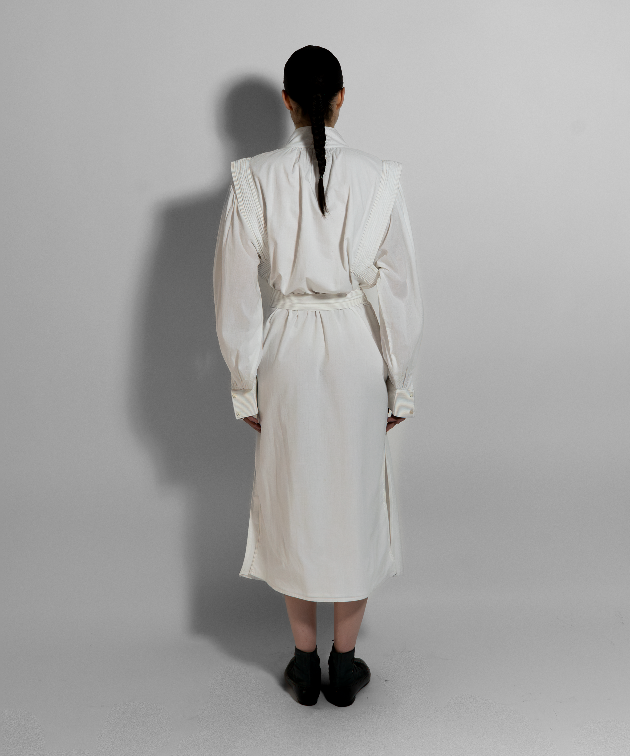 MAY dress back view, cream cotton voile with hand embroidered cuffs, sculptural minimalist luxury fashion