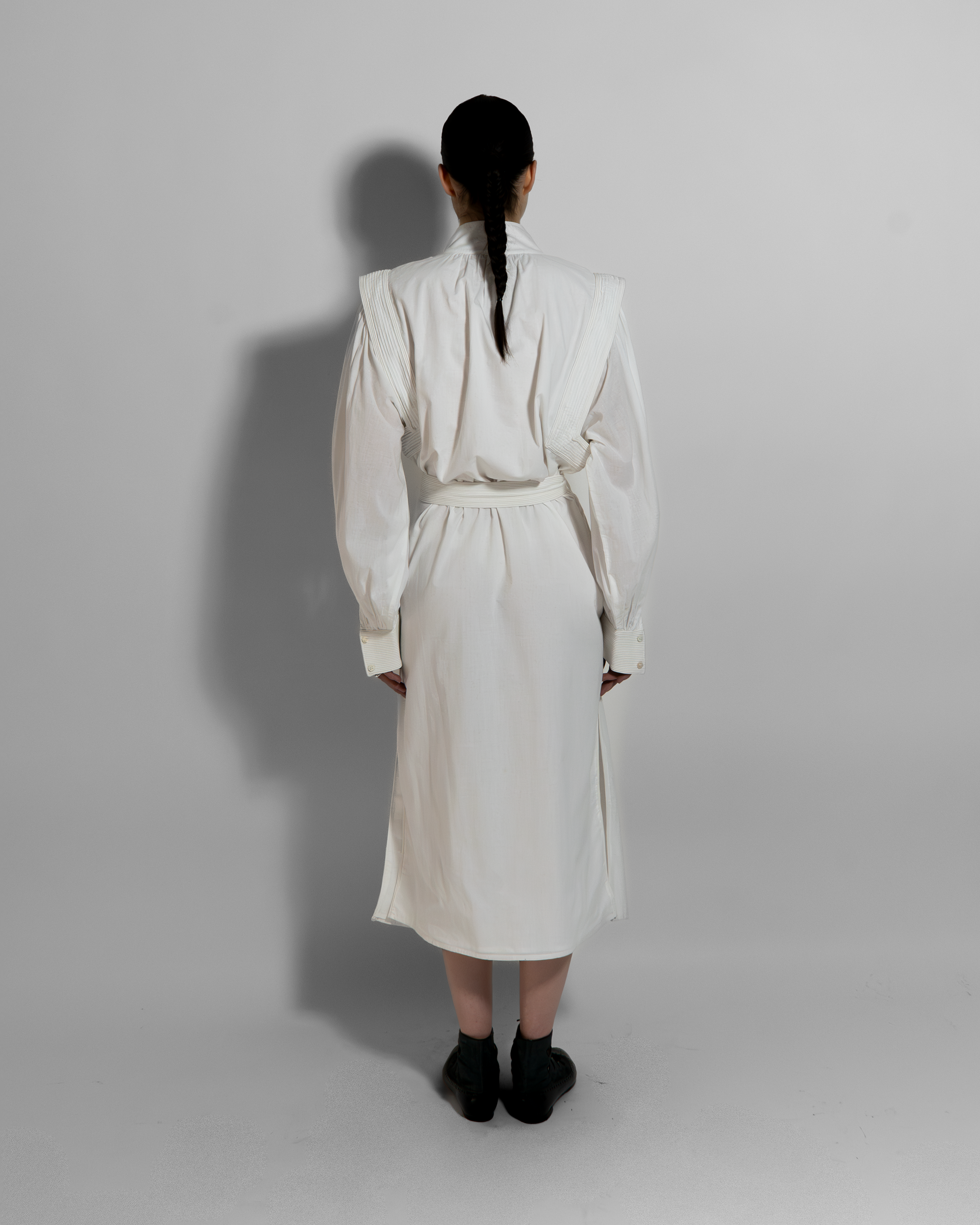 MAY dress back view, cream cotton voile with hand embroidered cuffs, sculptural minimalist luxury fashion