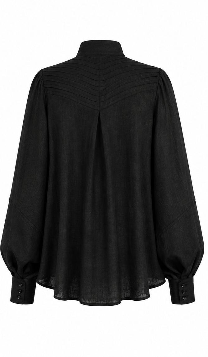 Black linen Cate shirt with sculptural pleated back, voluminous sleeves, and handmade details by Aymone Studio