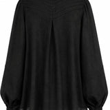 Black linen Cate shirt with sculptural pleated back, voluminous sleeves, and handmade details by Aymone Studio